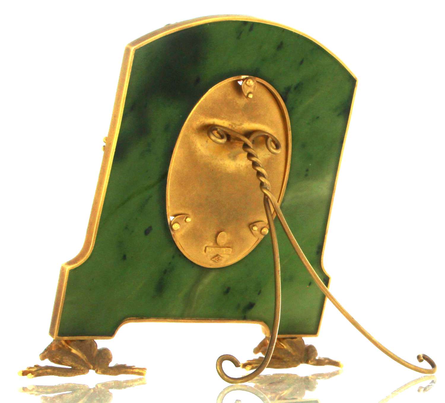 Side angle of The Art of Zadora photograph frame displaying polished green BC jade and luxurious 18kt yellow gold craftsmanship