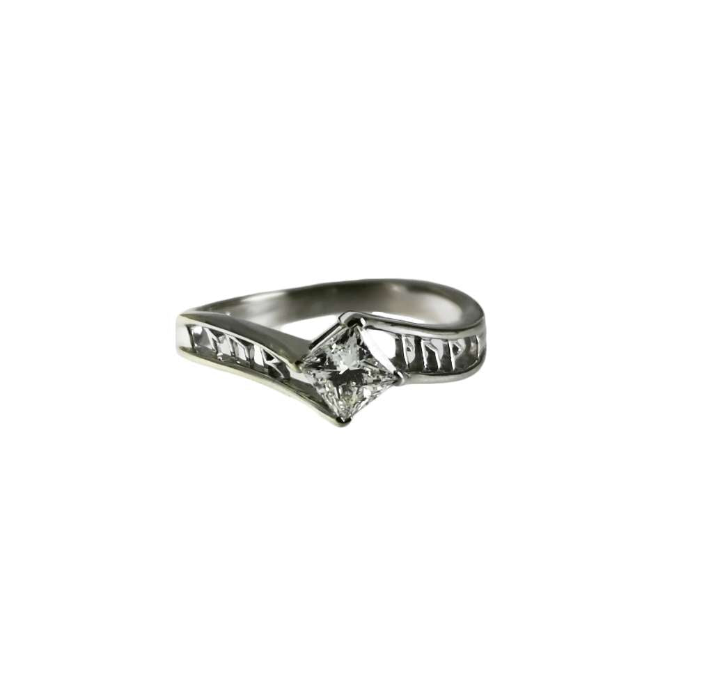 14kt white gold ring showcasing a princess cut diamond, front angle, sparkling clarity visible