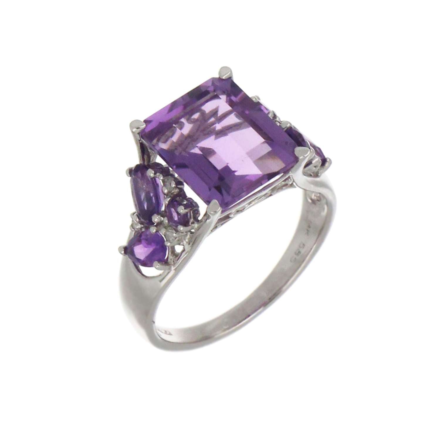 Side profile of 14kt white gold amethyst ring highlighting claw diamond settings