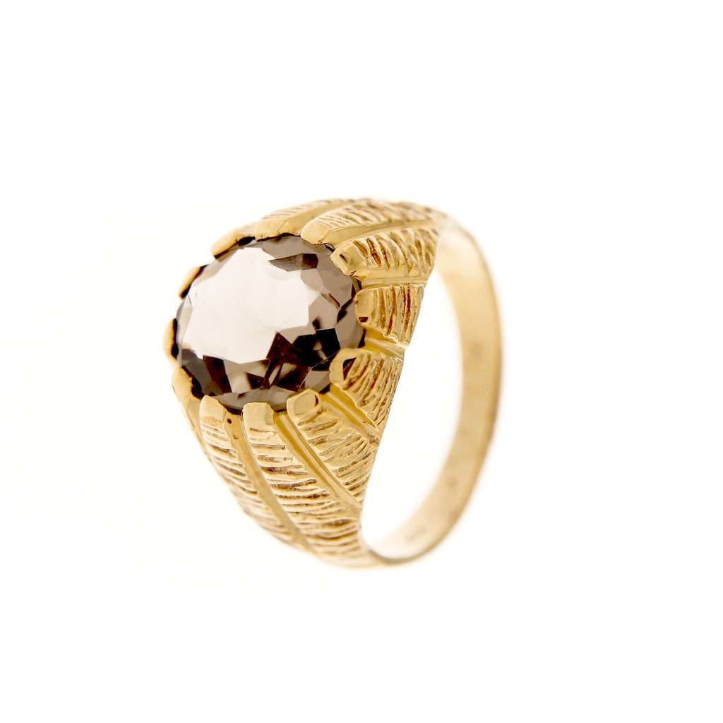 10kt yellow gold men's ring with oval faceted smoky quartz seen from top angle