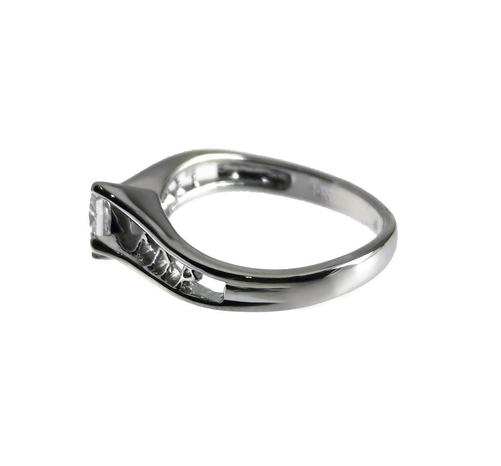 Side view of 14kt white gold ring with 0.61ct princess cut diamond in 4-claw setting