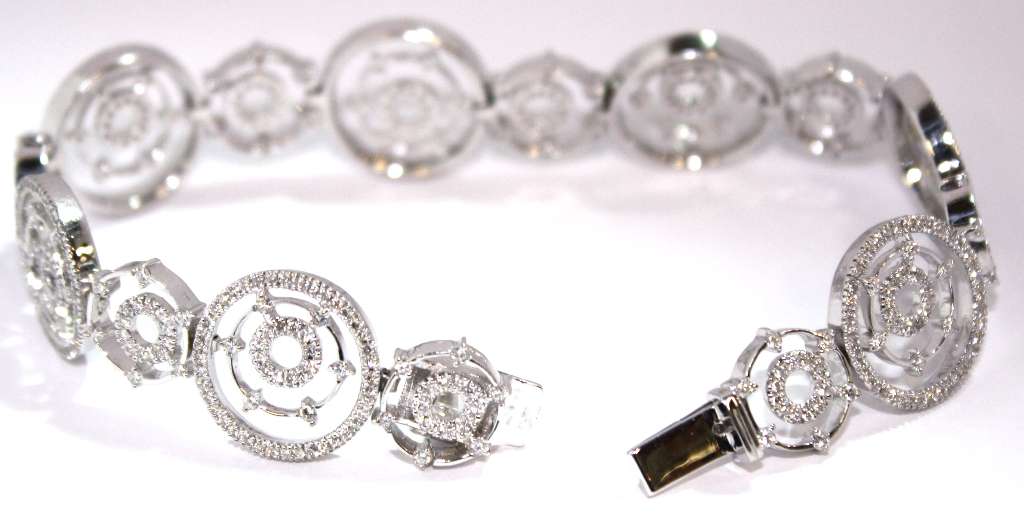 Luxury white gold diamond bracelet weighing 24.16 grams with stunning G-I color grade diamonds in a continuous row