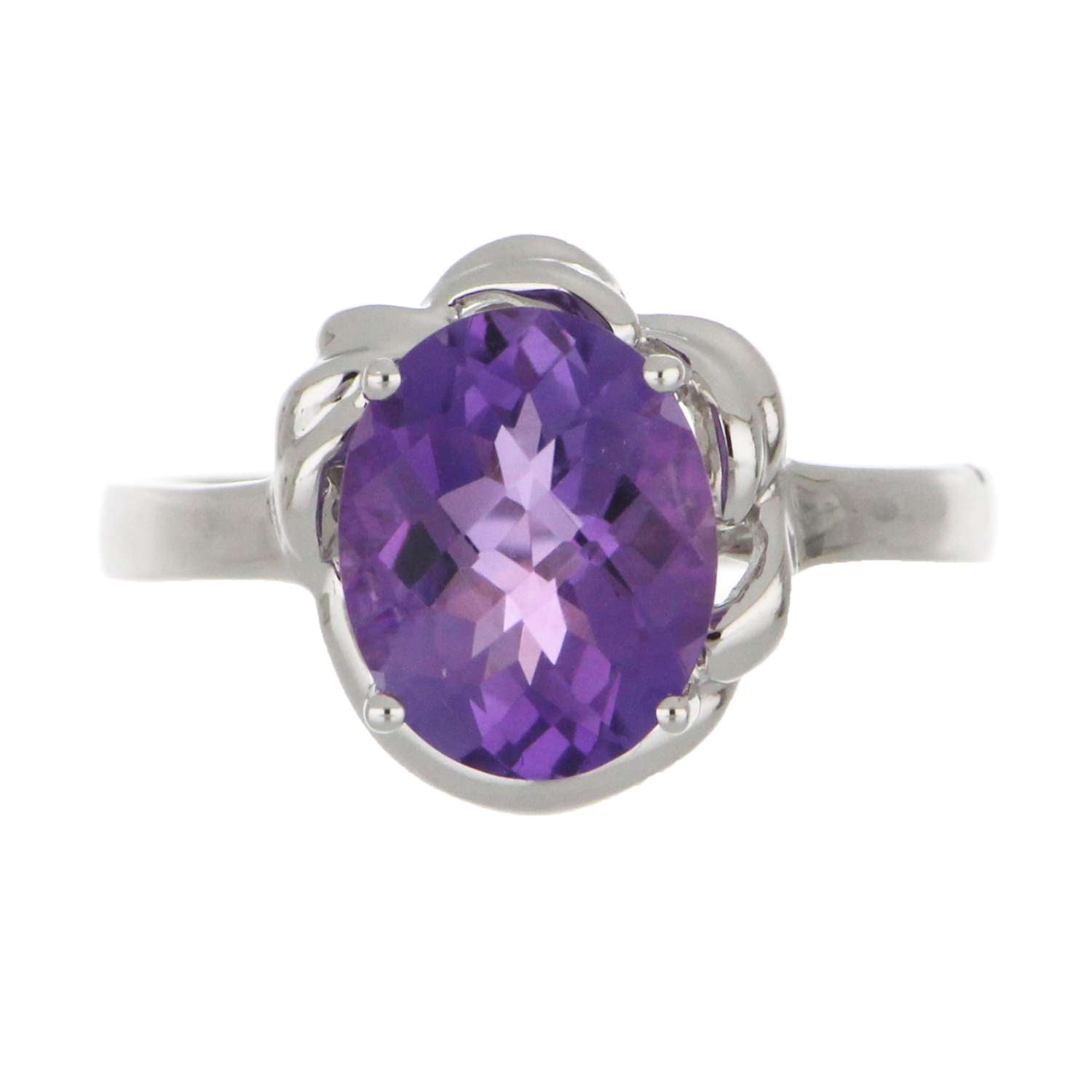 14kt white gold amethyst ring displayed on black background emphasizing the oval purple stone and reflective metal