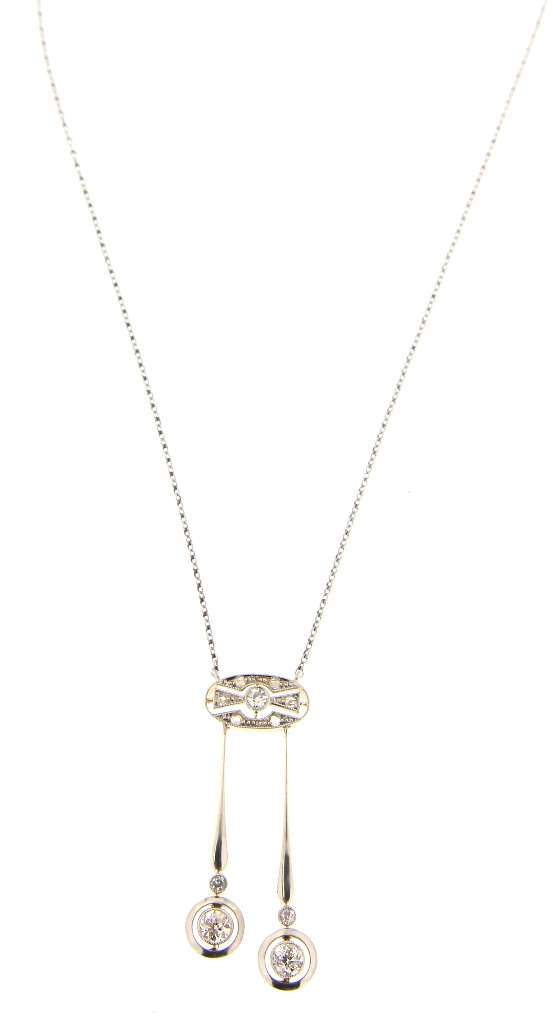Detailed close-up of old European cut and rose cut diamonds in 14kt white gold antique necklace