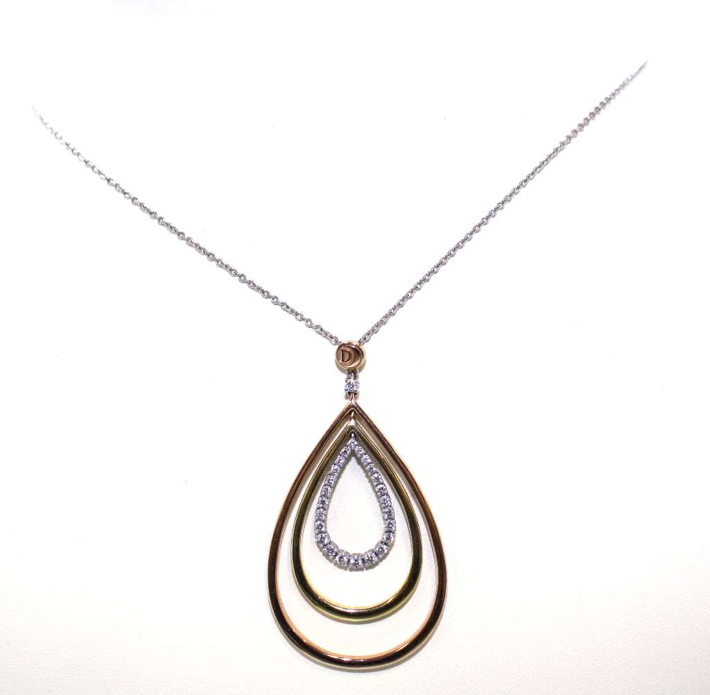 Side angle of 18kt tri-color gold diamond pendant hanging on 20-inch white gold cable link chain, total weight 12.04 grams