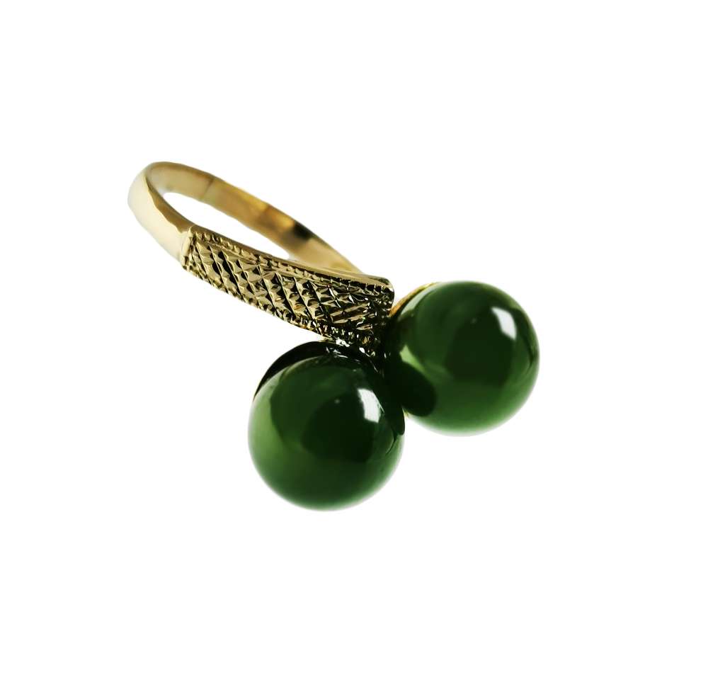 Detailed overhead shot of 10kt yellow gold ring showing two round green BC jade beads set side-by-side with a 3.00 gram total weight
