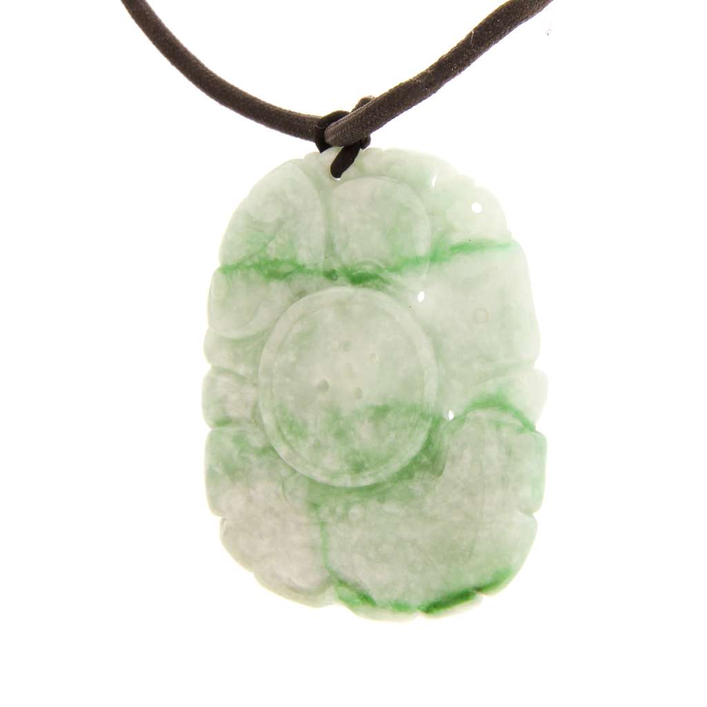 Reverse side of Burmese jadeite carved pendant featuring lotus leaf and old Chinese money symbol in lively green jade
