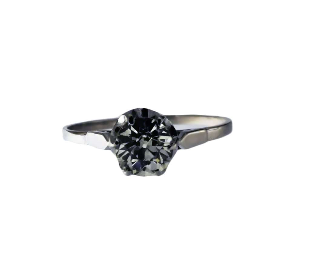 Close-up of 14kt white gold antique diamond ring showcasing old European cut diamond in 6-claw setting