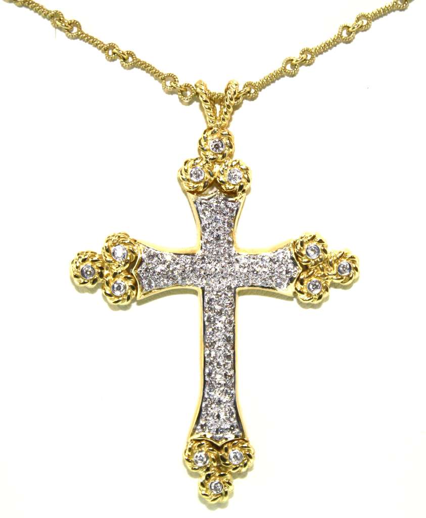 18kt yellow gold cross pendant set with 72 round brilliant cut diamonds, angled front close-up