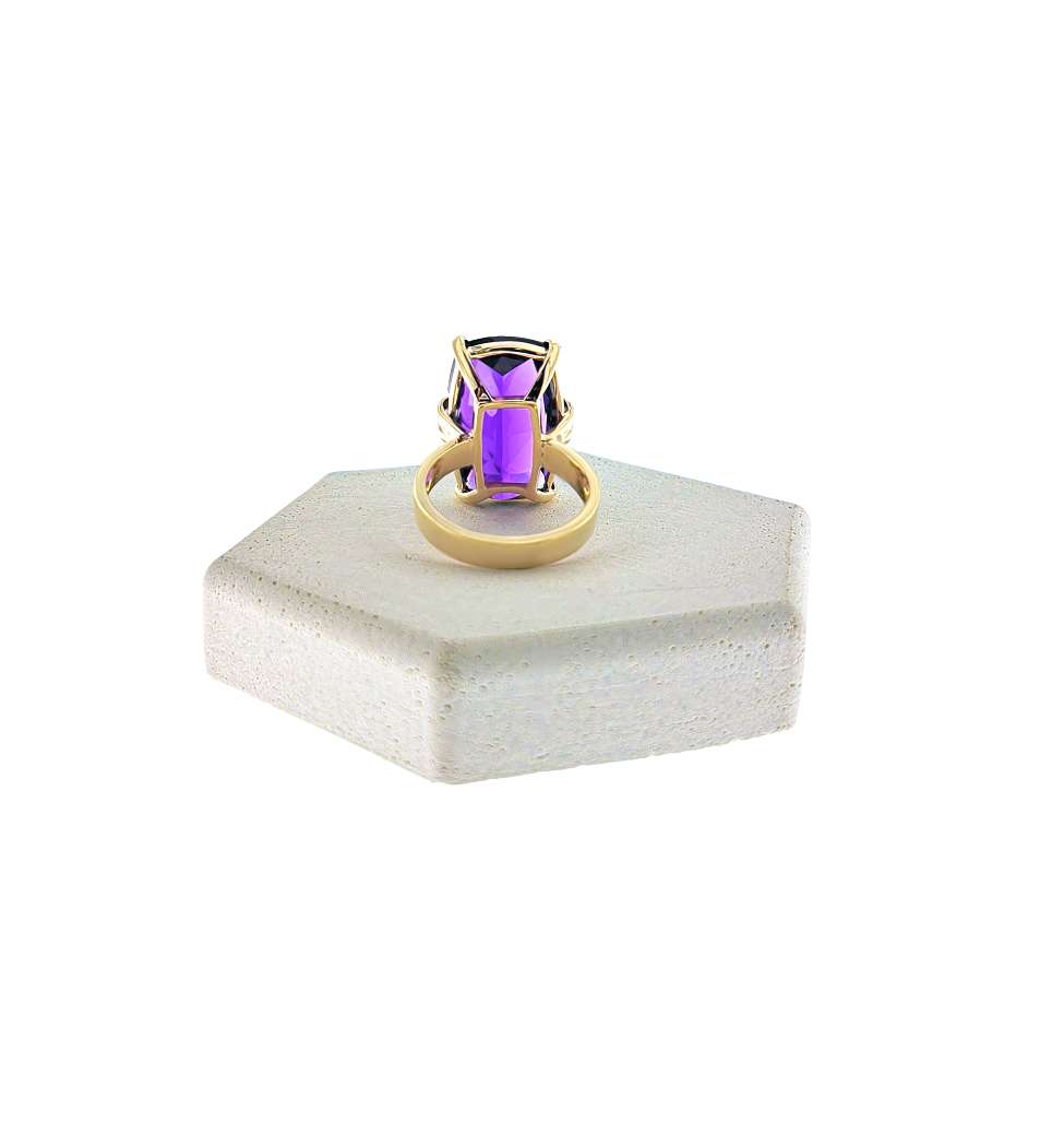 Close-up of the purple amethyst stone set in 14kt yellow gold ring highlighting gemstone clarity and ring weight
