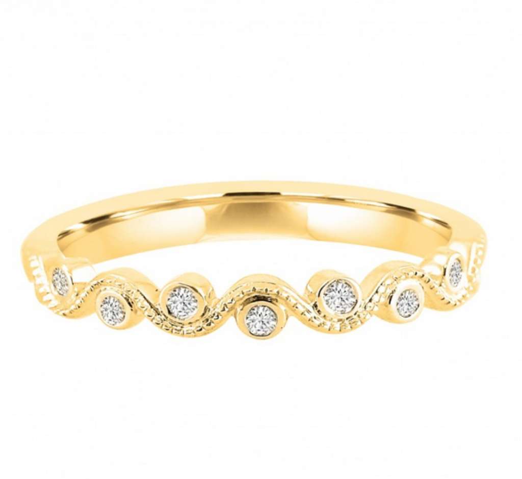 10kt yellow gold wave-style diamond band ring angled to show 9 single cut diamonds totaling 0.07cttw