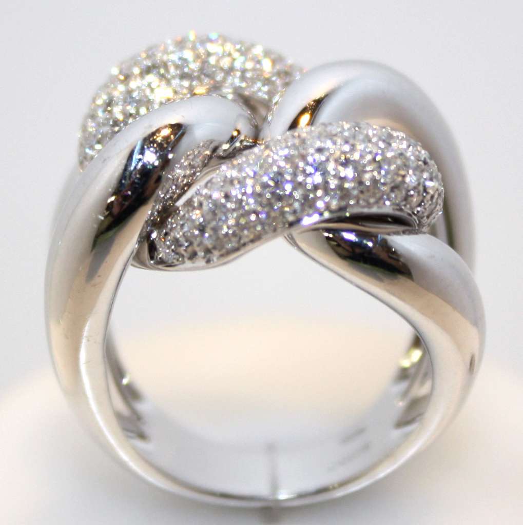 18kt white gold diamond ring featuring 122 round brilliant cut diamonds seen from top angle, total weight approximately 15.90 grams