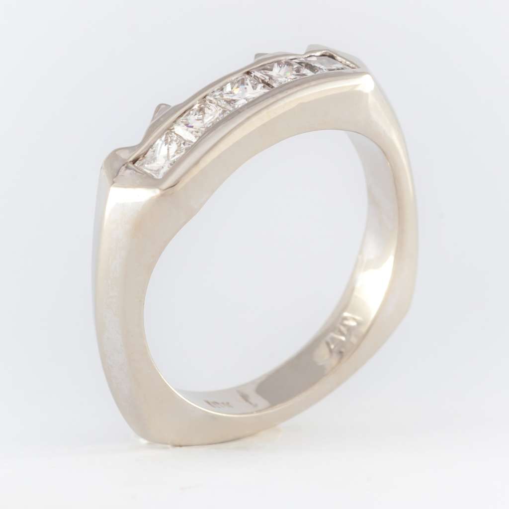 18kt white gold ladies' wedding band showcasing five princess cut diamonds viewed from top angle, total diamond weight 0.50cttw