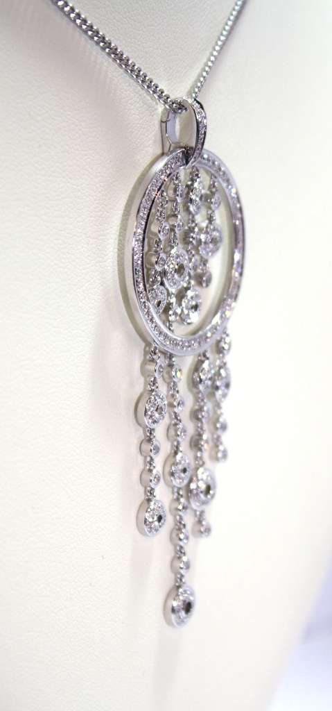 Side profile of elegant 18kt white gold pendant with enhancer bail and 1.45cttw diamonds