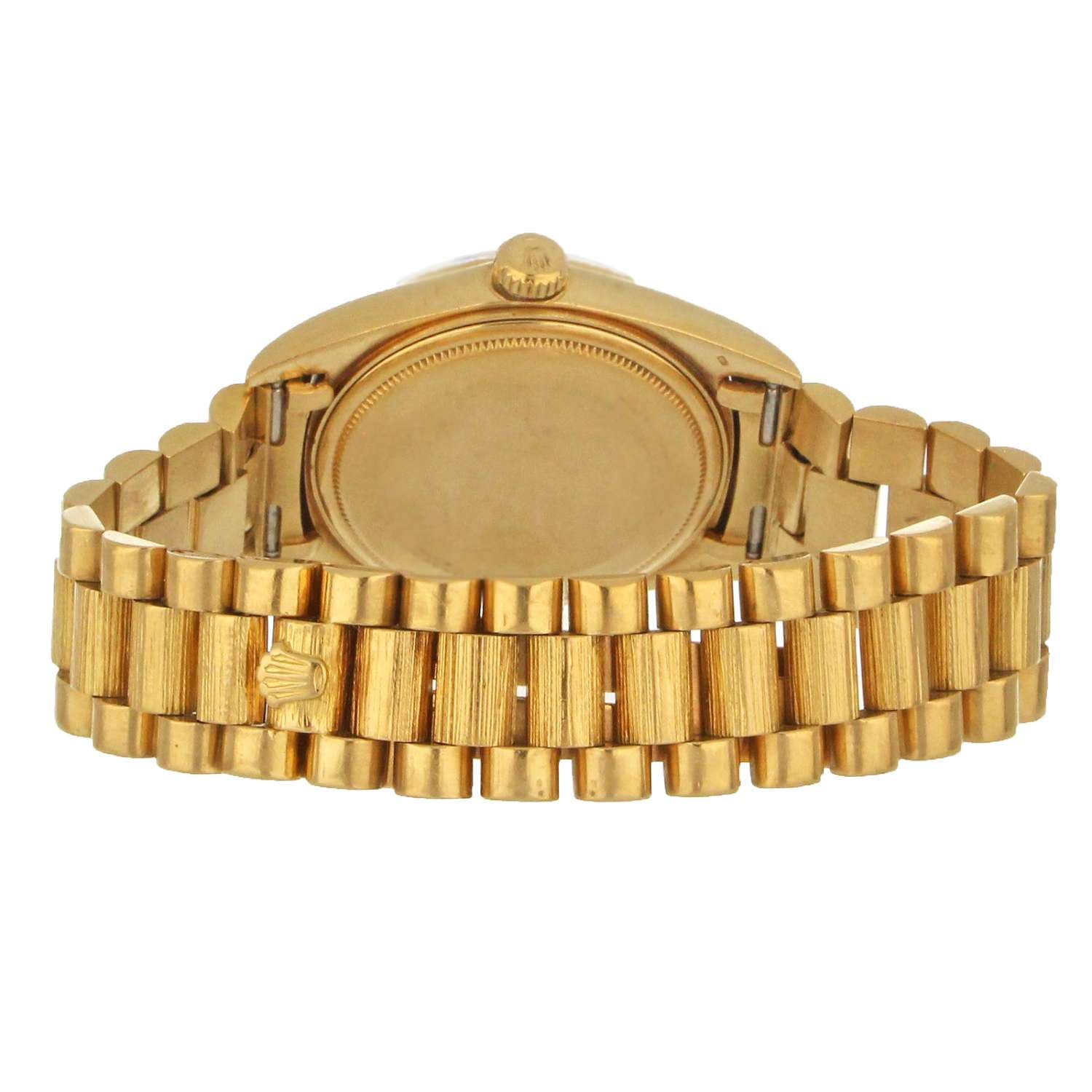 Detailed view of the gold President bracelet links and clasp of Rolex Day-Date wrist watch