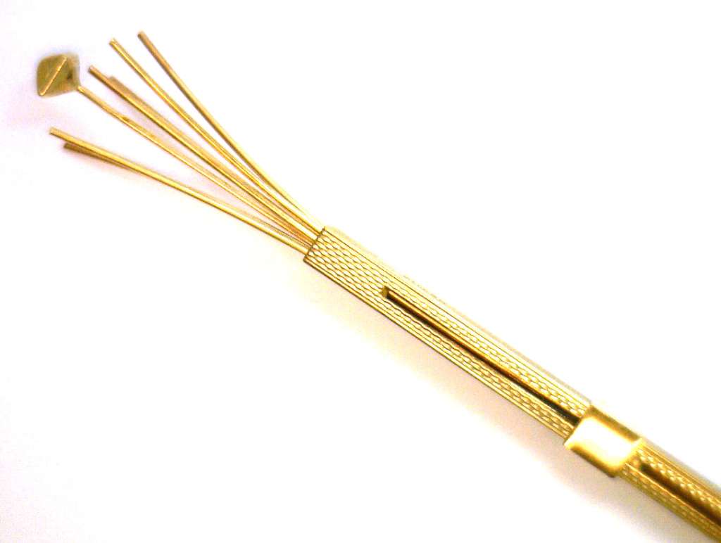 Artisan-crafted 9kt yellow gold pendant with unique stir tool design detail