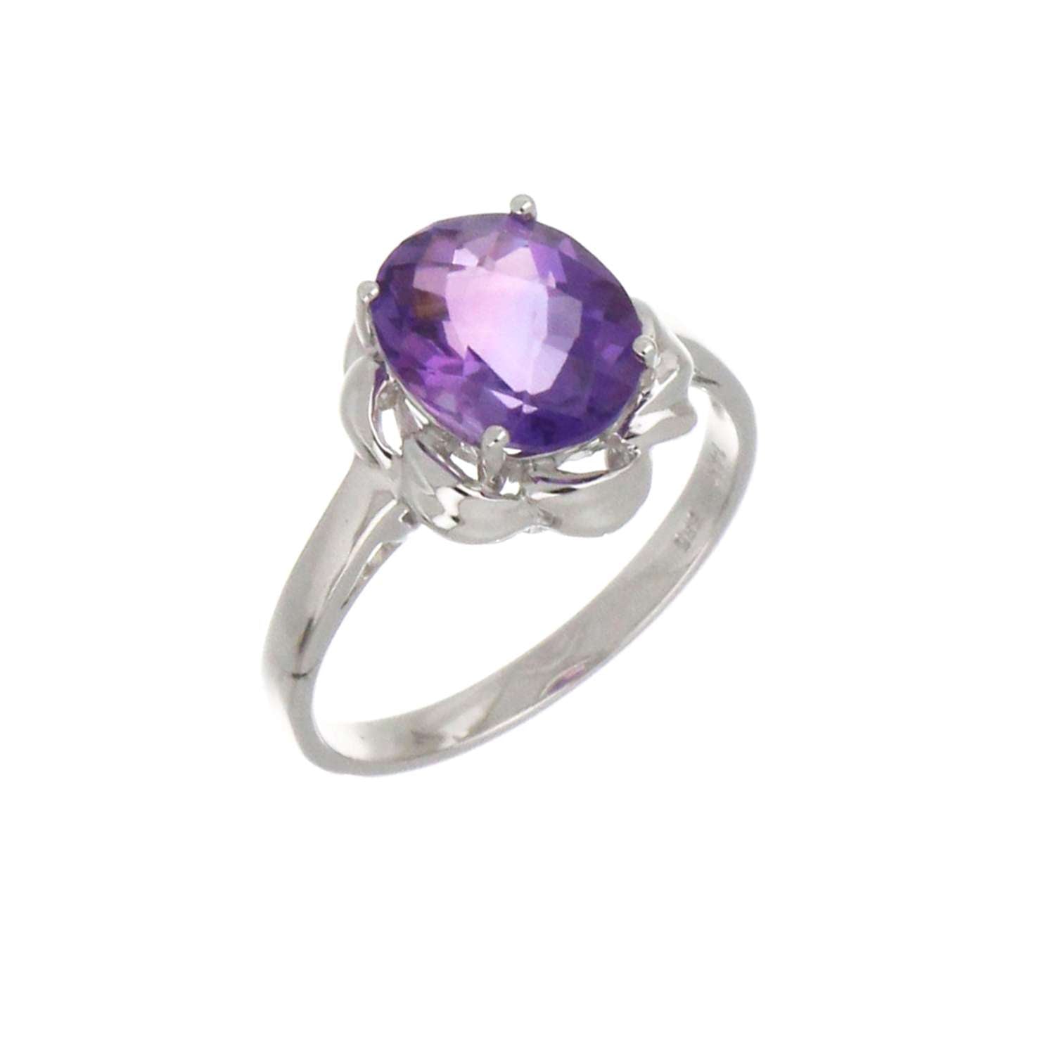 Top view of 14kt white gold amethyst ring highlighting the chess cut oval purple gemstone and smooth band