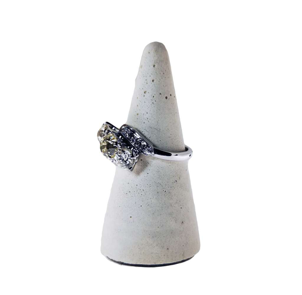 Side angle of 18kt white gold old cut diamond ring showing the diamond settings and craftsmanship details