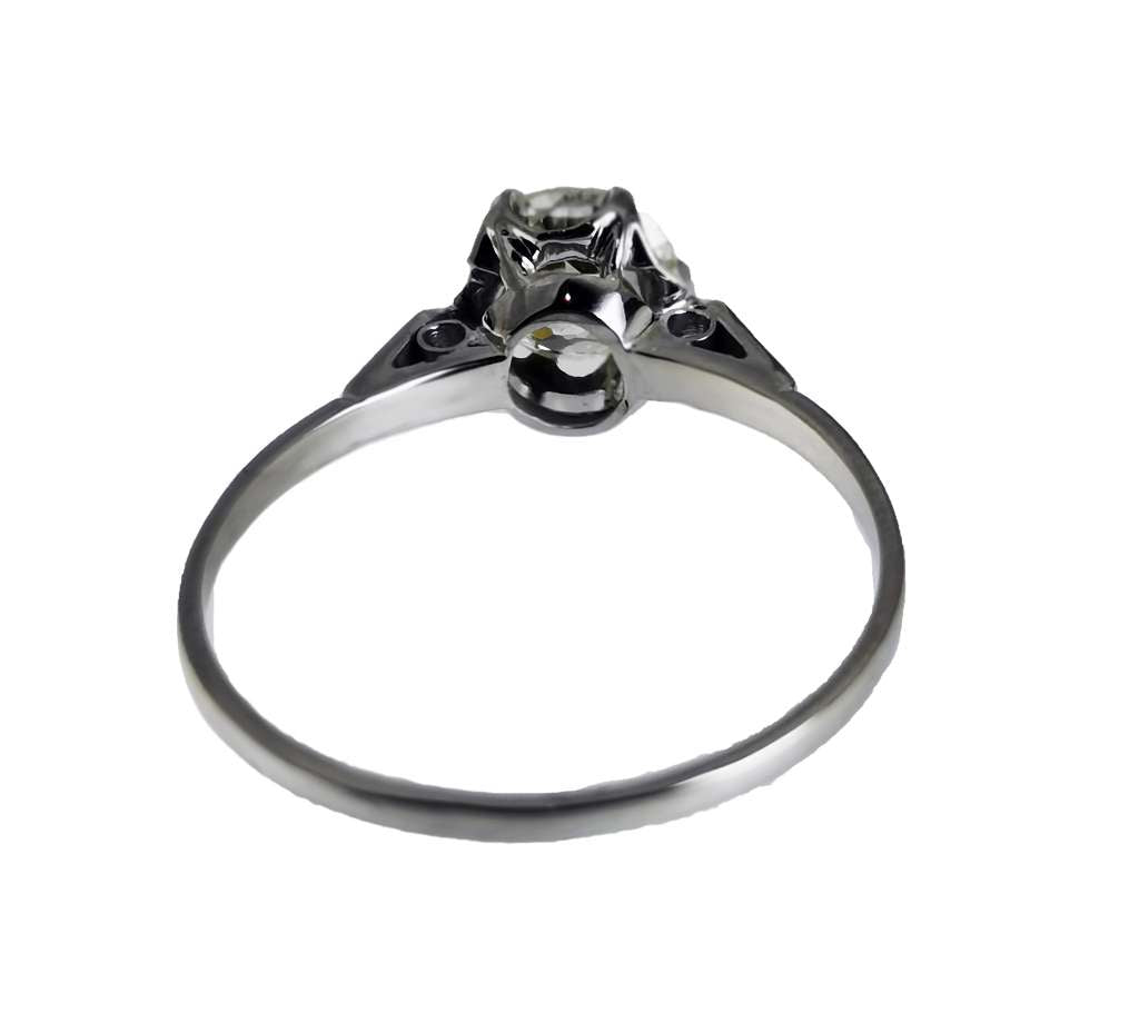 Detailed overhead shot of white gold antique diamond ring highlighting 1.19ct old European cut stone