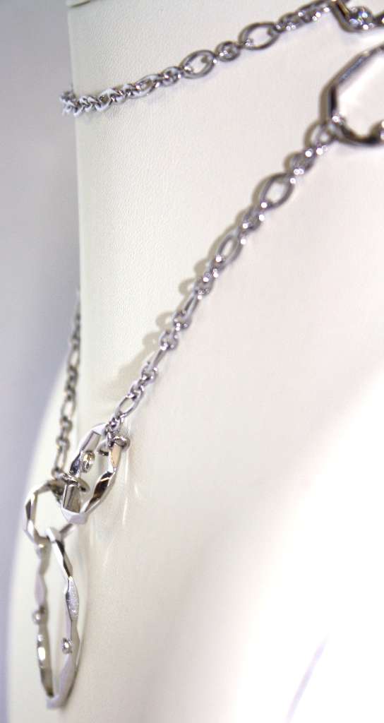 Detailed view of diamond clasp and white gold chain of necklace weighing 29.22 grams
