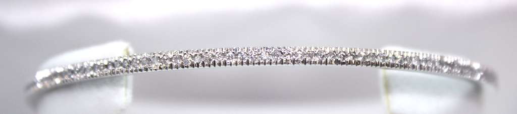 14kt white gold diamond bangle viewed front with 159 round brilliant cut diamonds, total 1.20cttw