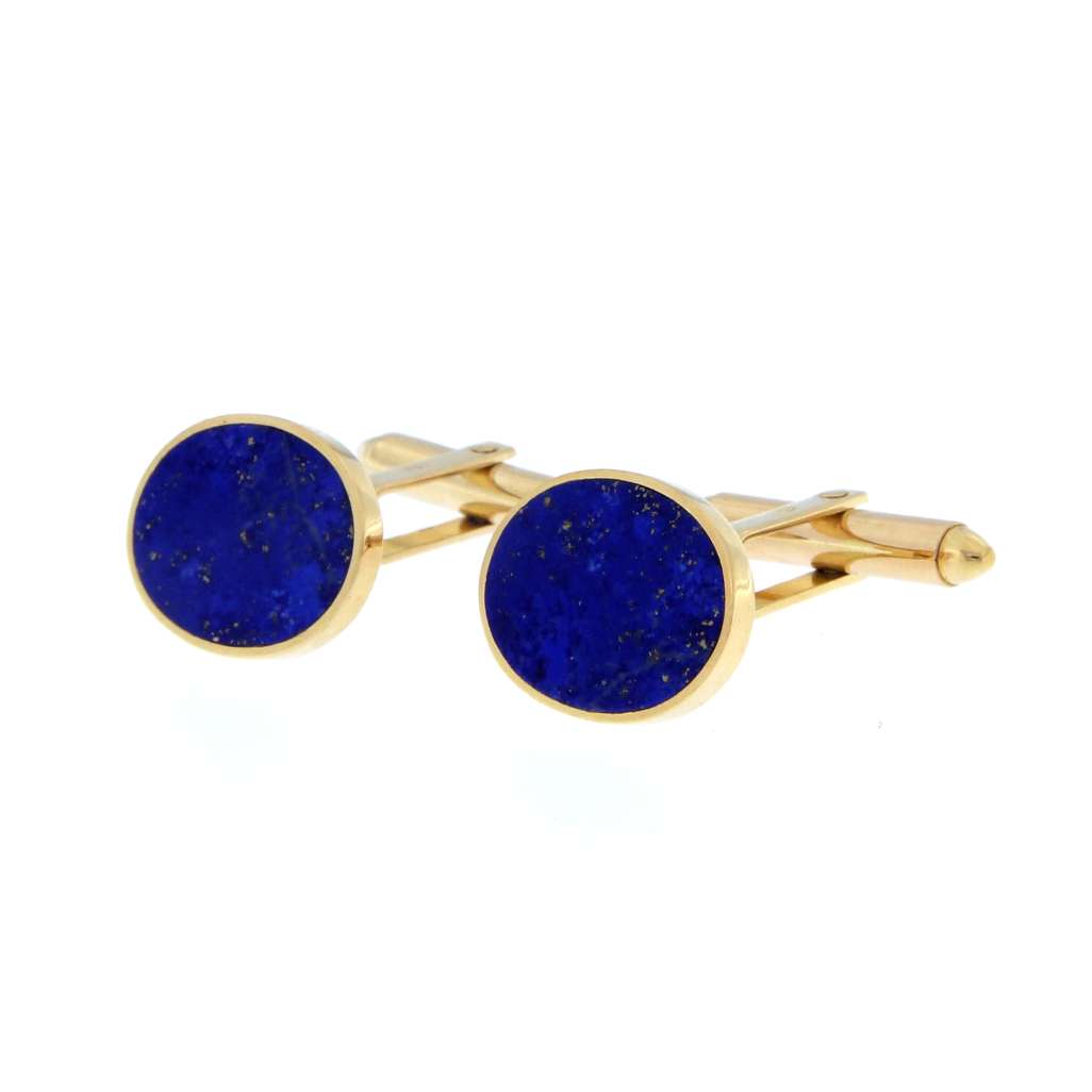 Close-up of 18kt yellow gold cufflink with oval Lapis Lazuli stone, plain bezel style, showing rich blue color