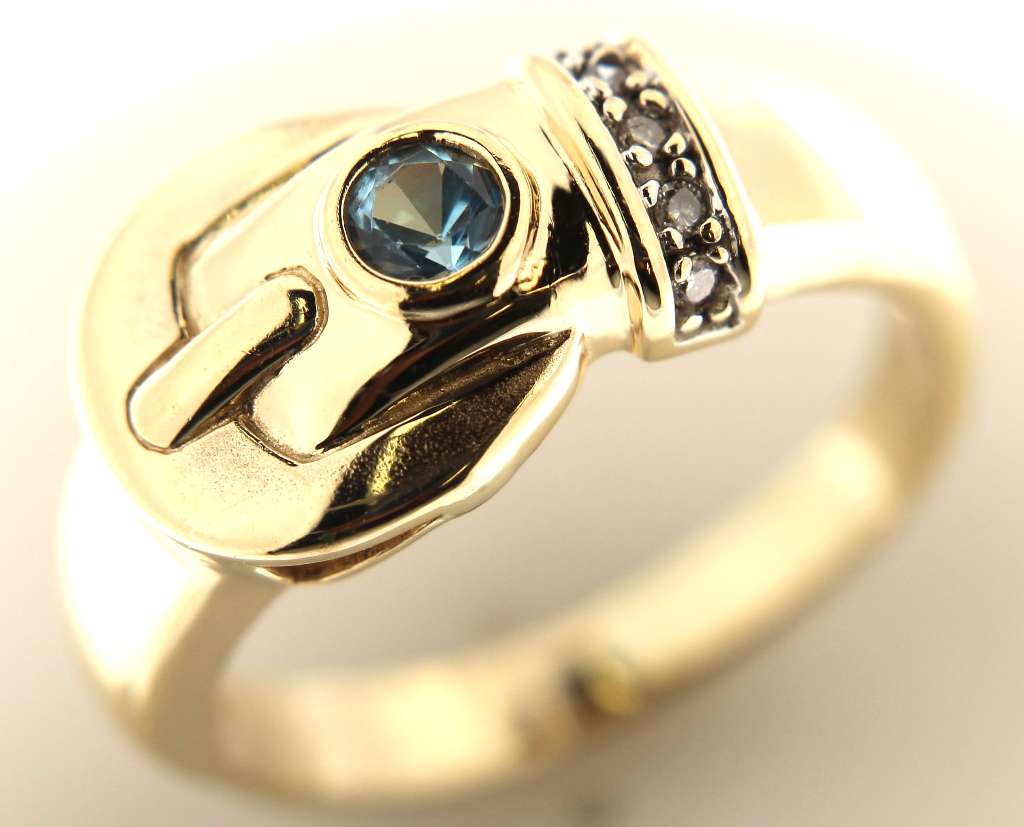 14kt yellow gold dinner ring featuring a round blue topaz center stone and five small bezel-set round full cut diamonds, side angle view