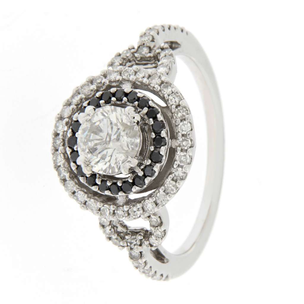 Side profile of 14kt white gold diamond ring showing claw setting and black diamond accents