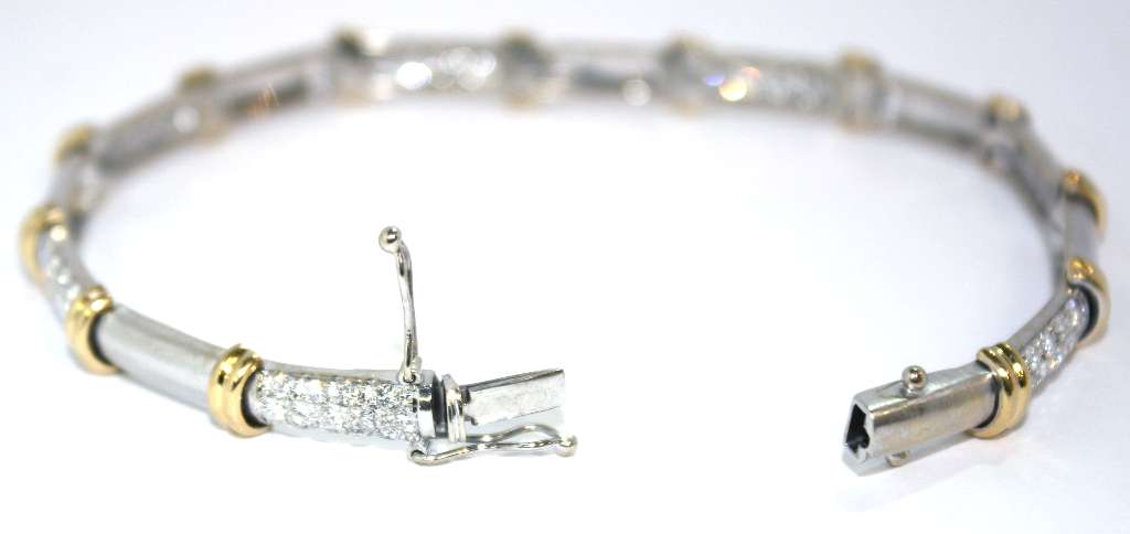Detailed image highlighting the clasp and diamond setting on a luxurious 7-inch 18kt gold diamond bracelet