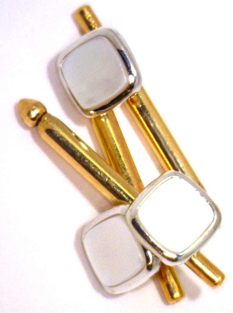 Close-up of 10kt yellow gold shirt studs with round 5.5mm white mother-of-pearl set in white gold bezel, front angle