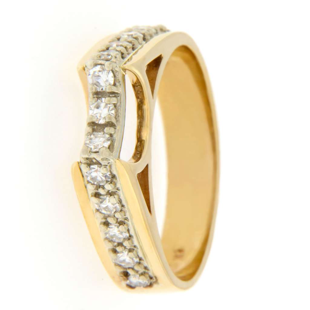 Detailed shot of 14kt yellow gold diamond ring highlighting VS clarity and H-I color single cut diamonds