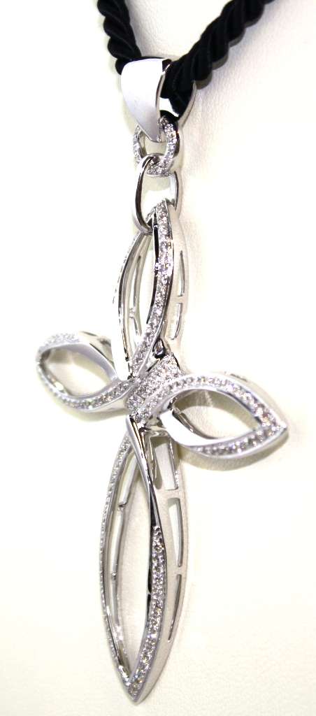 Close-up of 18kt white gold pendant diamond cluster highlighting VS-SI1 clarity round diamonds totaling 1.18cttw