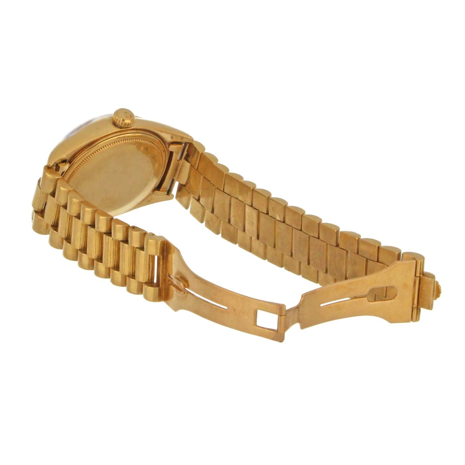 Back view of vintage Rolex Oyster Perpetual Day-Date showcasing solid gold case back