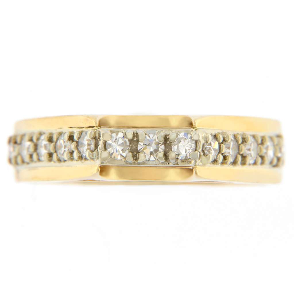 Close-up of a ladies' 14kt yellow gold diamond ring showcasing 13 single cut diamonds in a classic design, ring size 5.5