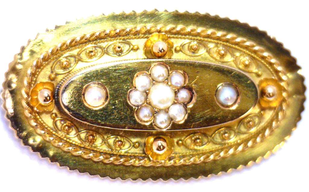 Side angle view of 15kt yellow gold antique brooch highlighting the elegant pearl setting and secure clasp detail, weighing 8.48 grams