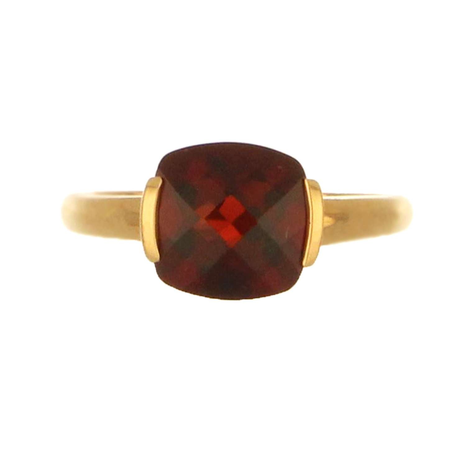 14kt yellow gold garnet ring displayed on dark background, emphasizing rich red garnet and polished gold band