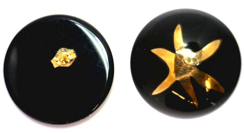 A pair of 14kt black onyx stud style earrings