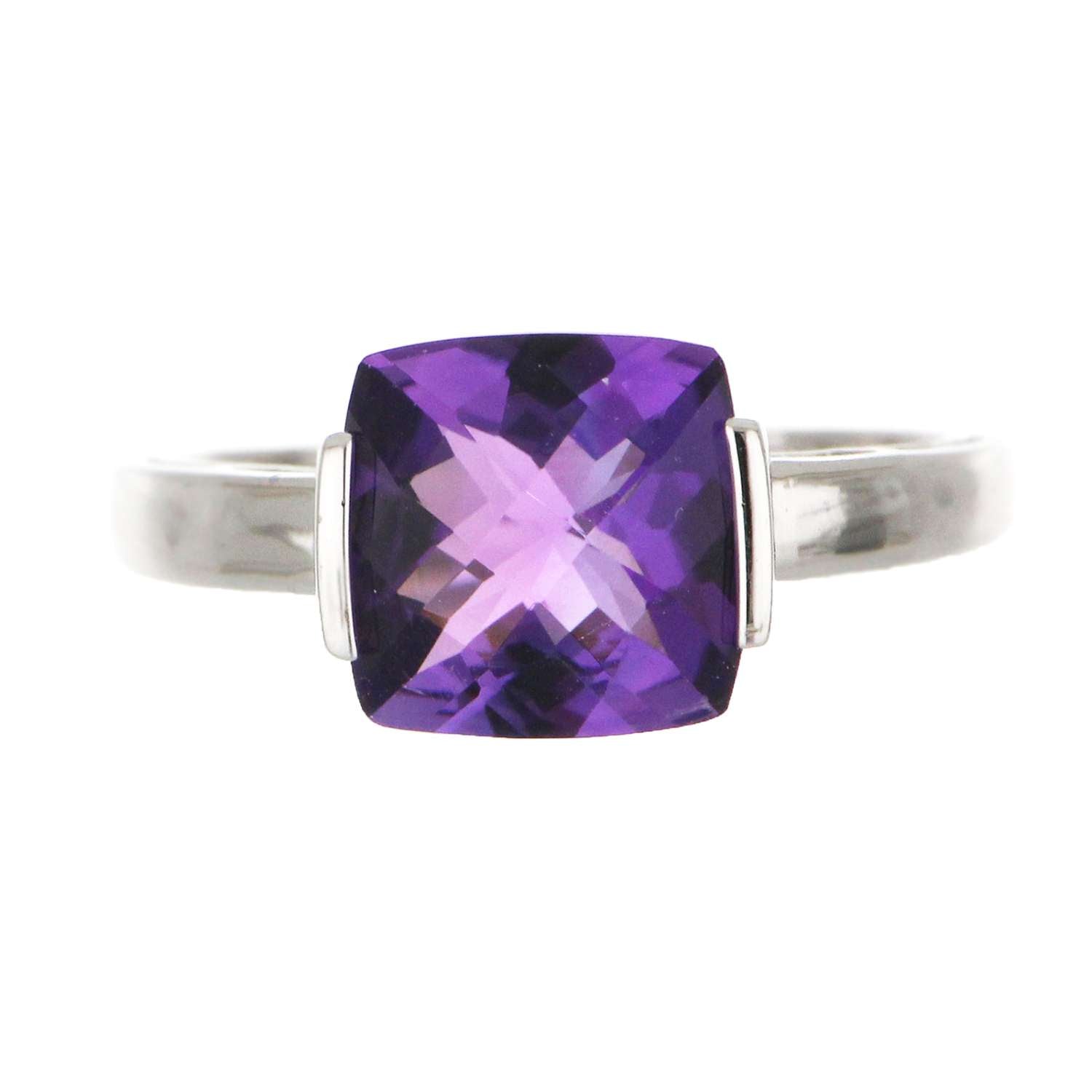 Elegant 14kt white gold amethyst ring with chess cut cushion amethyst displayed against white background